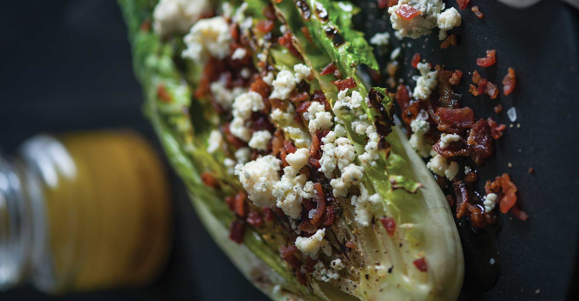 Grilled Romaine Hearts with Bacon, Bleu Cheese, and Citrus Hefeweizen Vinaigrette Recipe